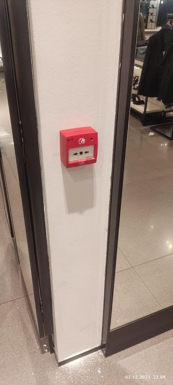 Manual call point installed in a corridor